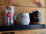 Personalized cups and mugs at Turtle Island Coffee Shop in Bend, Ore., on Jun. 7, 2024.