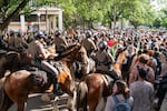 Texas State Troopers on horseback work to disperse pro-Palestinian students protesting the Israel-Hamas war on the campus of the University of Texas in Austin on Wednesday.