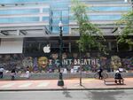 Early in demonstrations against the police killing of George Floyd, protesters smashed the windows and looted downtown Portland's Apple Store. The plywood that was put up to protect the building from further intrusion has since turned in to a memorial for Floyd and other Black people killed by law enforcement, as well as a tribute to the movement for racial equality and against police brutality.