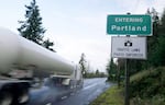 A semi rolls down U.S. Highway 30 near the northern boundary of Portland in March. The busy roadway poses a dangerous challenge to frogs who migrate between their spawning site at the Harborton wetland and their summer habitat in Forest Park. 