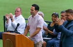 Ricky Gomez, owner of Portland's Palomar restaurant, speaks at the  Reopening Oregon Celebration at Providence Park in Portland, Ore., June 30, 2021. Gov. Kate Brown announced the end to mandatory mask use and social distancing.