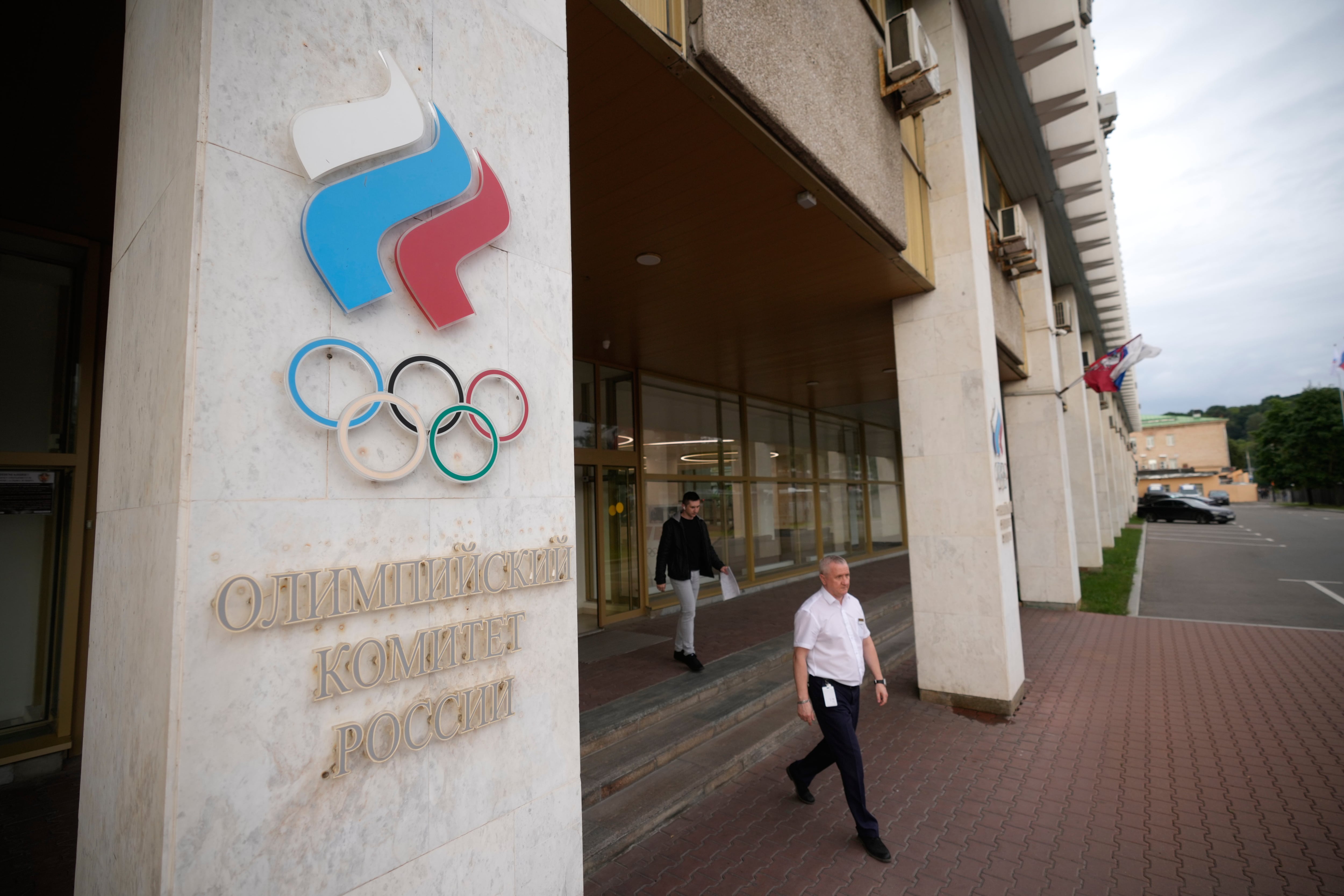 A man walks outside the Russian National Olympic Committee building in Moscow on Tuesday.