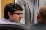 Samson Garner listens as his lawyers talk on the second day of trial in the State of Oregon v. Garner case in Deschutes County Circuit Court in Bend, Ore., on Aug. 19, 2025.