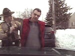 This image taken from police dashcam video shows Gregory Bombard getting arrested on Feb. 9, 2018 n St. Albans, Vt.  Vermont has agreed to pay $175,000 to settle a lawsuit on behalf of Bombard who was charged with a crime for giving a state trooper the middle finger in 2018, the state chapter of the American Civil Liberties Union said Wednesday, June 26, 2024.