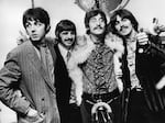 "We were able to take John's voice and get it pure through this AI," Paul McCartney says. The Beatles are seen here celebrating after finishing their album, Sgt. Pepper's Lonely Hearts Club Band.