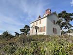 The Yaquina Bay Lighthouse, built in 1871, served mariners for only a few short years before it was decommissioned in favor of the Yaquina Head Lighthouse in 1874. Still, the little wooden lighthouse remains a beacon—for millions of visitors and history buffs. Exterior renovations will begin January 1, 2025.