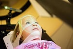 Vivian Rose Weaver continues to sit still after technicians made her radiation mask at OHSU on Feb. 4, 2019, in Portland, Ore.