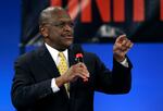 Former Republican presidential candidate, businessman Herman Cain, speaks during a Unity Rally Sunday Aug. 26, 2012, in Tampa, Fla.