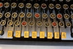 The MingKwai typewriter's keys enable the typist to find and retrieve Chinese characters.