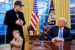 President Trump is joined by Elon Musk and his son, X Musk, at the Oval Office in the White House in Washington, D.C., on Feb. 11, 2025. The Trump administration and the DOGE team are looking to cut the federal workforce.