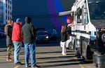 Customers order and wait outside the Tokyo Sando food truck, which has more than 21,000 followers on Instagram and an overall rating of 4.5 on Yelp.