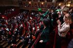 French lawmakers applaud after National Assembly President Yael Braun-Pivet announced the result of the vote during a joint session of parliament in the Palace of Versailles, southwestern of Paris, on Monday, to anchor the right to abortion in the country's constitution.