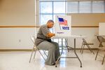 A voter fills out a ballot in Jackson, Miss., on Tuesday. Federal and local officials have worked closely with researchers to track rumors and conspiracy theories in recent elections but that cooperation is fading under pressure from conservatives.