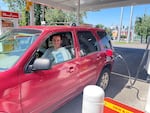 Oregonian Alex Fox sits in his car at a Portland gas station in June. He just learned to pump his own gas - at 28. “I was a little bit anxious. I actually had to ask someone next to me if they knew how to do it. But once they explained it, it was pretty easy.”