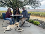 Tim and Kelly Hightower sit with Janet Krupin at Hightower Cellars on Red Mountain, which was featured in “Sunset Road.”