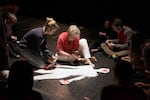 Rachel Harry (center) works with Sara Zeman (left) on a final performance art project at Hood River Valley High School.