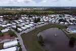 An aerial view of a pond at Heritage Plantation, Wednesday, June 8, 2022, in Vero Beach.