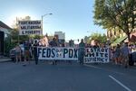 Protesters march down Main Street in Ashland on Saturday, July 25, 2020, in solidarity with Portland demonstrations.