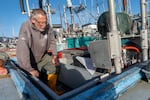 Kelly Barnett cleans and organizes equipment in his trawler boat after a day of fishing off the coast in Garibaldi, Ore., May 23, 2024. Barnett is a fishmonger on the Oregon coast that catches, fillets and sell fish to local customers and visitors.