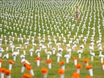 A field of flowers representing deaths from gun violence at the Giffords Gun Violence Memorial in front of the Washington Monument on June 7, 2022 in Washington, DC.