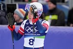 United States' Jacqueline Wiles waves at the finish area of an alpine ski, downhill portion of a women's team combined race, at the 2026 Winter Olympics, in Cortina d'Ampezzo, Italy, Tuesday, Feb. 10, 2026.