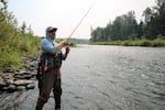 James Adkins with the Association of NW Steelheaders casts a spinner into the Clackamas River July 22 2026. 