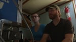 The Washington Department of Fish and Wildlife's Dayv Lowry (right) monitors video transmitted from a remotely operated submersible.