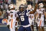 Nevada running back Savion Red (6) celebrates after running for a touchdown against Oregon State in the second half of an NCAA college football game in Reno, Nev., Saturday, Oct. 12, 2024.