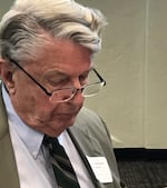 Bill Mansfield is pictured here in 2018  listening to his introduction at the Center for NonProfit Legal Services’ Pro
Bono Award in 2018. That work included defending civil liberties, including the rights of free speech, movement, travel and assembly.