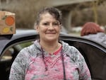 Helen Cruz has been repeatedly fined for sleeping in Grants Pass, despite having no other place to go. Between house cleaning jobs, Cruz delivers 100 food boxes once a week to people in parks.