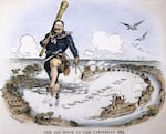 In this political cartoon, a giant President Theodore Roosevelt is walking in the Caribbean Sea and carrying a big club over his shoulder. One hand is holding onto a string that's connected to a chain of ships that are floating in the Caribbean.
