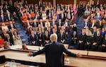 Members of Congress stand up and applaud as President Donald Trump delivers the State of the Union address in Washington, D.C., on Feb. 24.