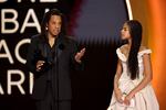 Jay-Z (left) accepts the honorary Dr. Dre Global Impact Award alongside his daughter, Blue Ivy Carter, during the 66th Grammy Awards on February 04, 2024 in Los Angeles, Calif.
