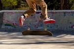 Francisco Pedraza Padilla Jr., 15, does a kick flip trick during an afternoon skating session with his friends. The three young men practice different tricks at the skatepark at least three times a week.