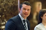 FILE - Pete Hegseth walks to an elevator for a meeting with President-elect Donald Trump at Trump Tower in New York, Dec. 15, 2016.