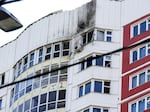 This photo shows a part of an apartment building which was reportedly damaged by Ukrainian drone in Moscow, Russia, Tuesday, May 30, 2023. In Moscow, residents reported hearing explosions and Mayor Sergei Sobyanin later confirmed there had been a drone attack that he said caused "insignificant" damage.