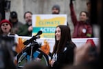 Maia Stout, a high school freshman from Newport, Oregon, gives a speech on the steps of the Oregon Capitol in Salem for a rally for climate action on Feb. 11, 2020.
