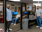 Richard Adams, left, Paul Gordon, center; and Patrick Bonga make up the staff of the Prison Mirror at the Minnesota Correctional Facility - Stillwater. The men say they're limited in what they can write about, but they still find meaning in the work.