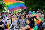 Viewers watch the Dykes That Ride motorcycle riders go past to start the 45th annual Seattle Pride Parade Sunday, June 30, 2019, in Seattle. (AP Photo/Elaine Thompson)