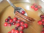 Simmer fresh cranberries in unsweetened apple juice on the stovetop until their skins split, releasing tannins and flavor.