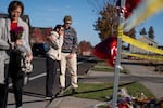 Christina Edwards, left, and Kyle Ketchum stand in front of Silver Rail Elementary School in Bend, Ore., on Oct. 16, 2026. 