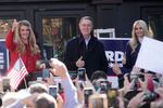 Sen. Kelly Loeffler, R-Ga., left, stands with Sen. David Perdue, R-Ga., and Ivanka Trump, Assistant to the President, during a campaign rally, Monday, Dec. 21, 2020, in Milton, Ga.