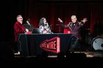 Live Wire's Luke Burbank and Elena Passarello interview actor and filmmaker Bruce Campbell during the variety show's 20th year, at Revolution Hall in Portland, Oregon, on Dec. 24, 2024.