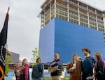 A drum circle performs on April 25, 2022 at Ilani Casino, in front of a forthcoming, 14-story hotel. Officials of neighboring towns hope the new hotel will bring more economic growth to the region.