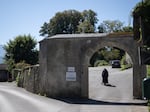 Sister Bernadette, 88, walks back to the convent chapel of the Goldenstein castle, in the municipality of Elsbethen, south of Salzburg city, Austria on September 20, 2025. Supporters of three rebel nuns in their 80s who had graced international headlines after fleeing their care home to occupy their former convent in Austria's Salzburg province flocked to the nunnery Saturday in a show of solidarity. (Photo by Joe Klamar / AFP) (Photo by JOE KLAMAR/AFP via Getty Images)