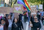 Hundreds marched through downtown Portland, Ore., to protest a leaked draft opinion by the U.S. Supreme Court indicating they would vote to overturn Roe v. Wade, Tuesday, May 3, 2022.