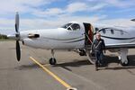 KinectAir CEO Jonathan Evans disembarks from a Pilatus PC-12 aircraft in Kalispell after joining a customer's flight from Vancouver, Washington.