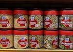 Containers of McCormick spices are displayed on a grocery store shelf on June 26, 2025 in San Anselmo, California.