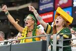 FILE - Green Bay Packers fans cheer during the first half of an NFL football game against the Arizona Cardinals Sunday, Oct. 19, 2025, in Glendale, Ariz.