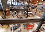 A shopper walks through REI's store in Seattle in 2018.